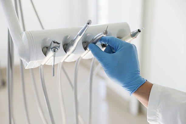 Professional Tooth Extraction technician working in Ladd, IL